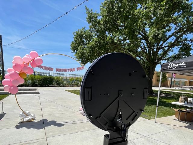 Photo booth set up outdoors for a school event