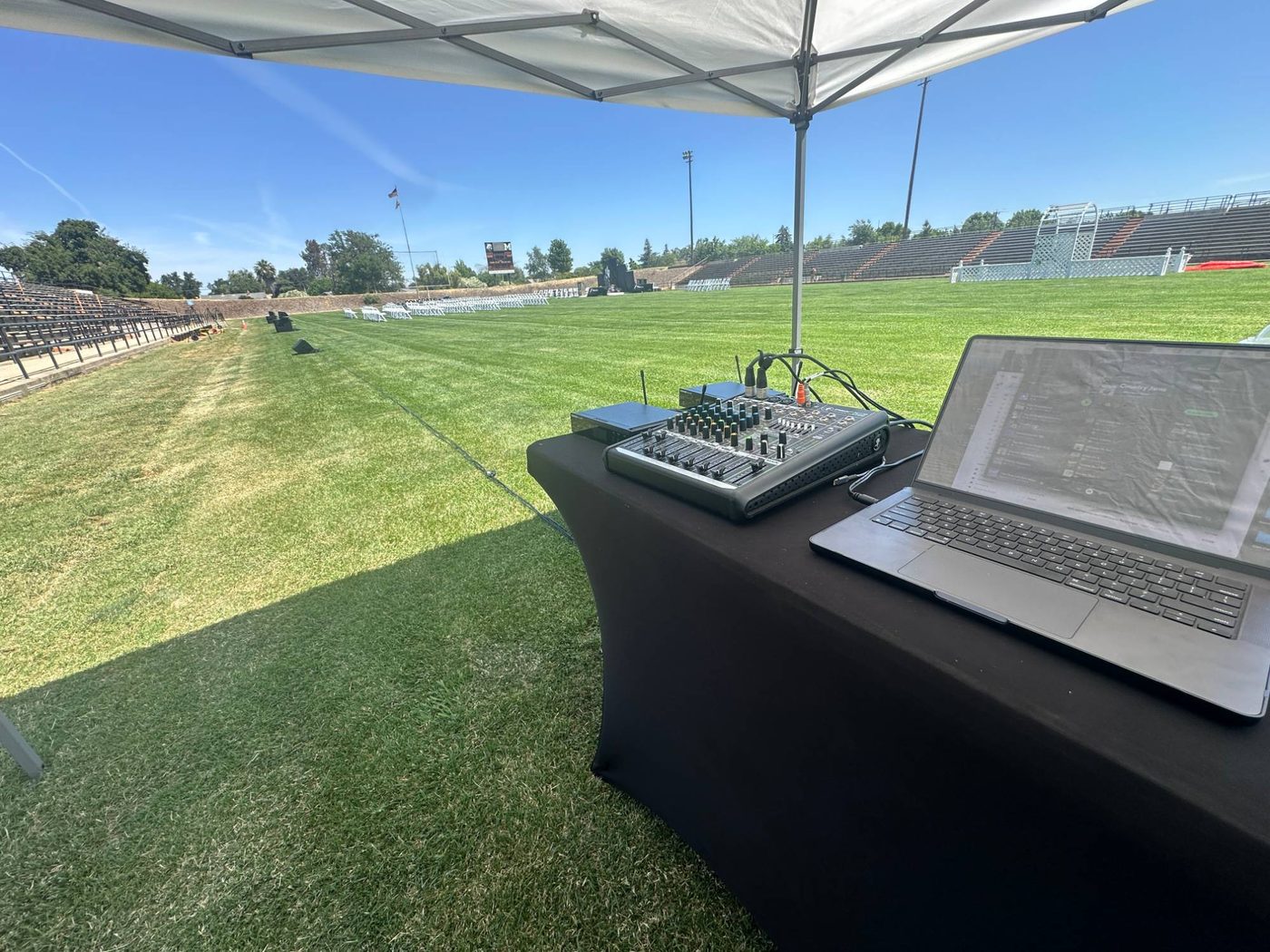 Galaxy live sound rig set up at a high school football field ceremony